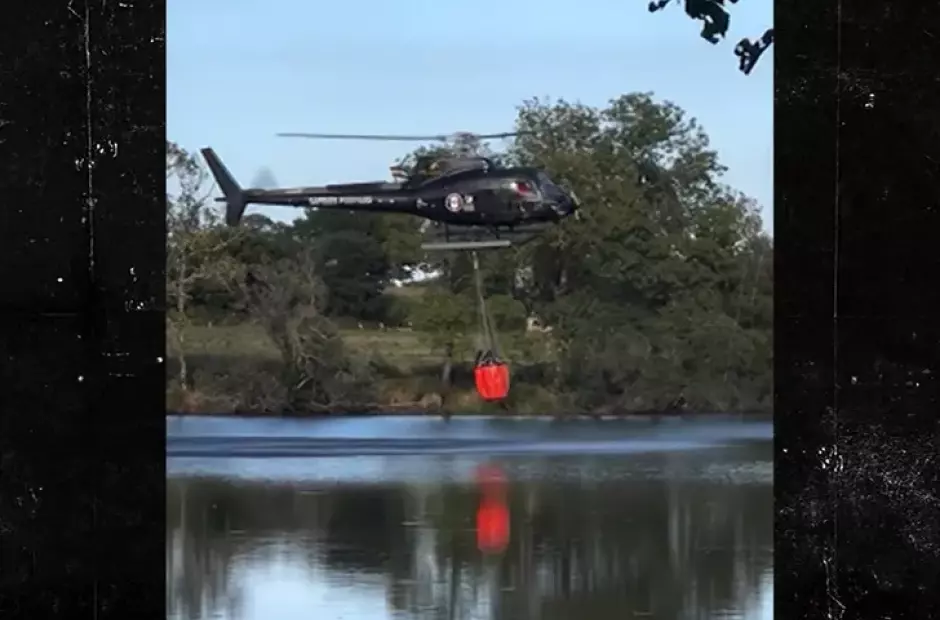 Vídeo flagra queda de helicóptero ao tentar coletar água em lago 